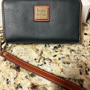 Dooney & Bourke leather Dark Blue Wristlet with Brown Strap
